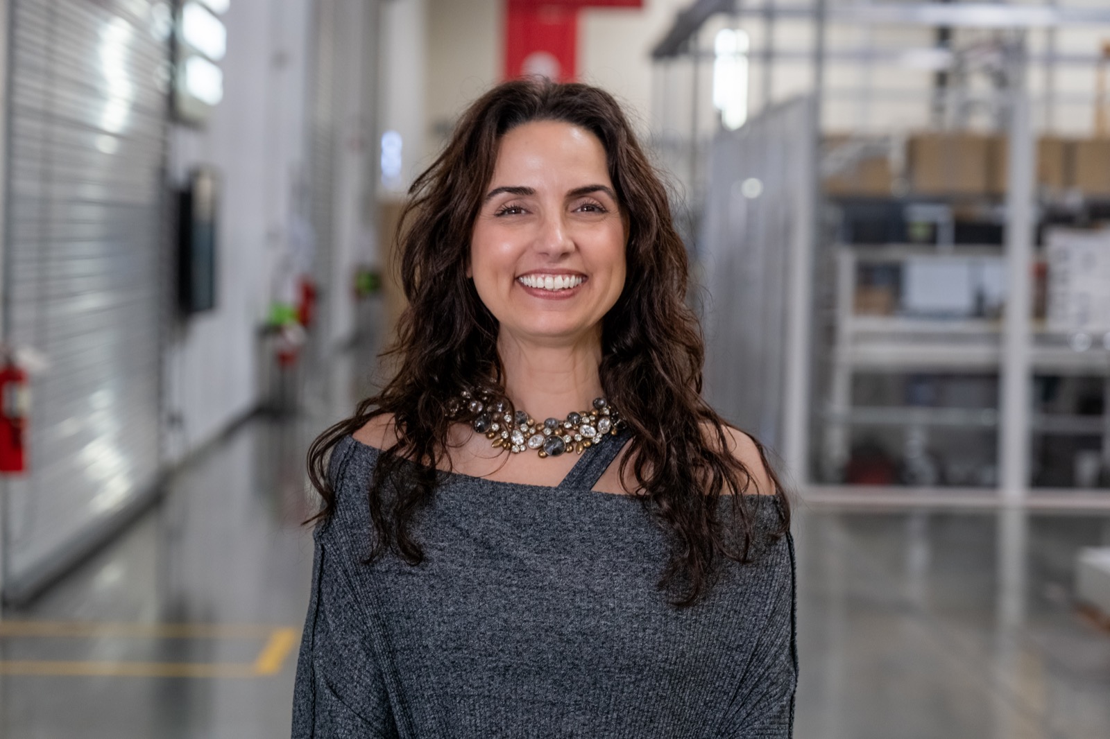 Leadership portrait in the aerospace production facility.