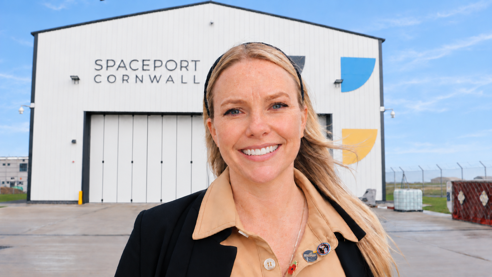Melissa Quinn smiling outside Spaceport Cornwall.
